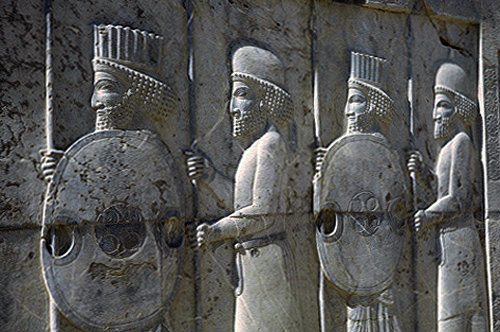 Iran, formerly Persia, Persepolis, capital of the Achaemenid Empire, detail  of bas-relief on outside of East staircase of Apadana, alternate Persian and Median Guards